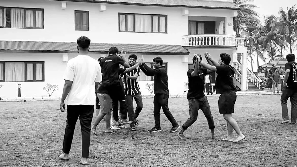 HappyFox colleagues playing an outdoor team game.