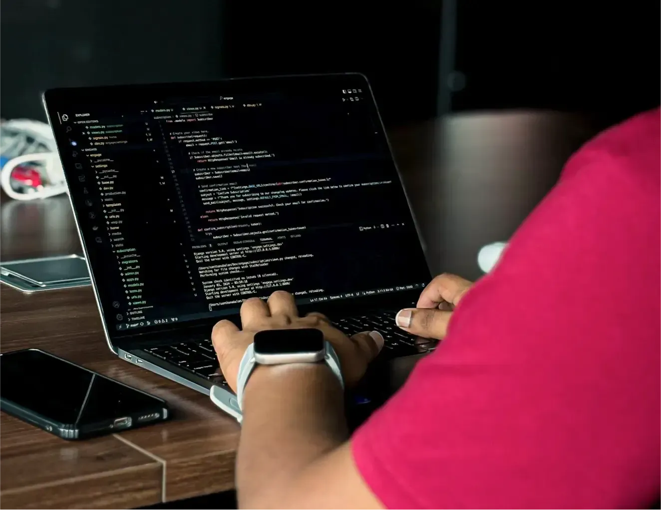 A HappyFox team member collaborating at a workstation.