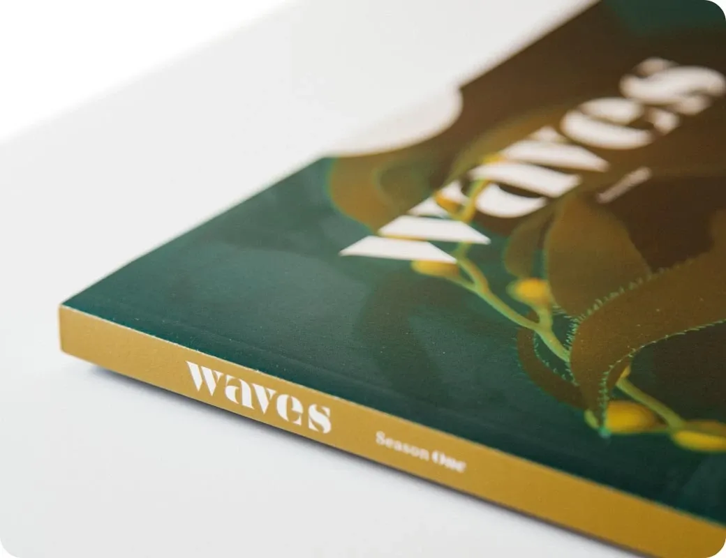 A bound publication illustrating Allura Printing’s commercial print work.